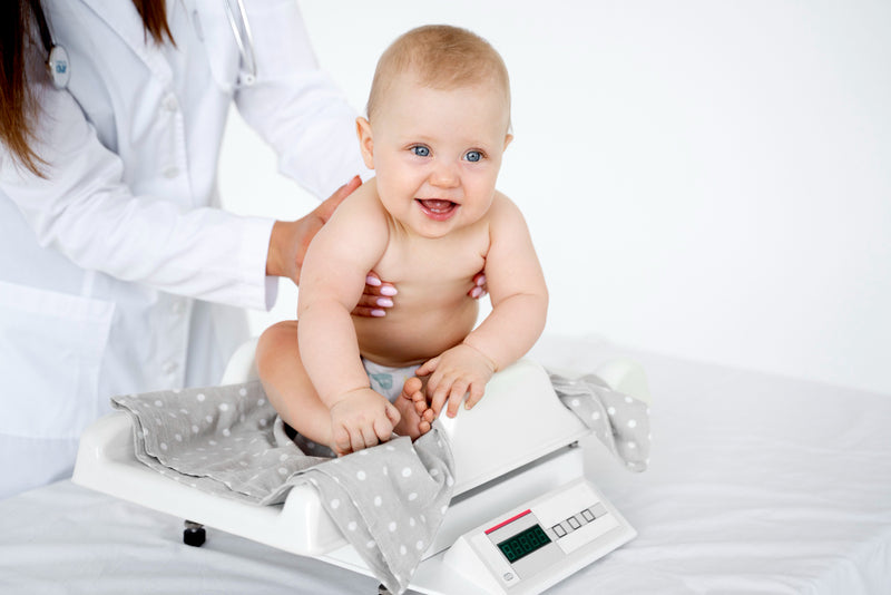 What is the average baby weight of a newborn baby and how does it change over the first year?